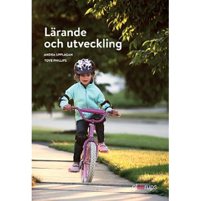 Barn på cykel.